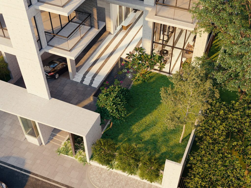 Modern building with a green lawn and trees.